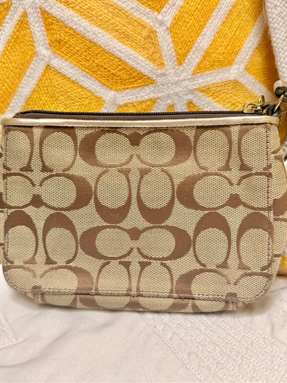 Coach Beige/Brown Signature Canvas Wristlet with Yellow Floral Accent
